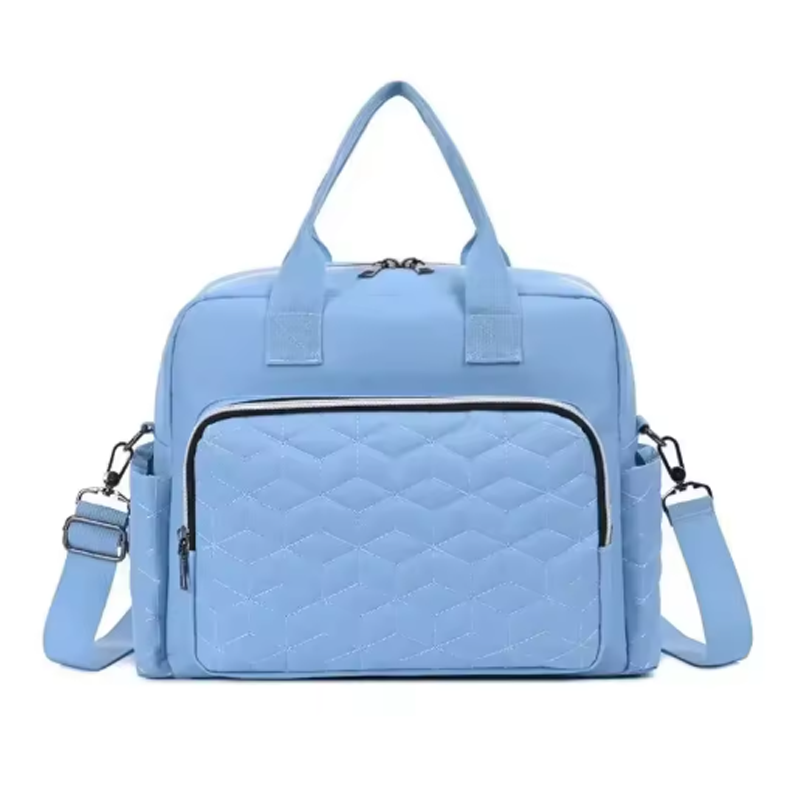 Sac à langer bleu clair au style doux et moderne pour maman