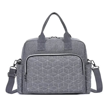 Sac à langer gris élégant et compact pour parents modernes