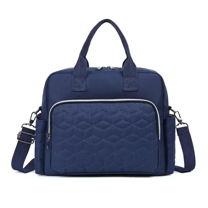 Sac à langer bleu foncé fonctionnel et spacieux avec poches pratiques